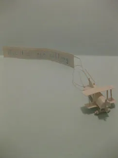 blue skies piece one, a handmade paper airplane, made with handmade paper