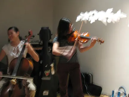 at sea band, cello and violin player